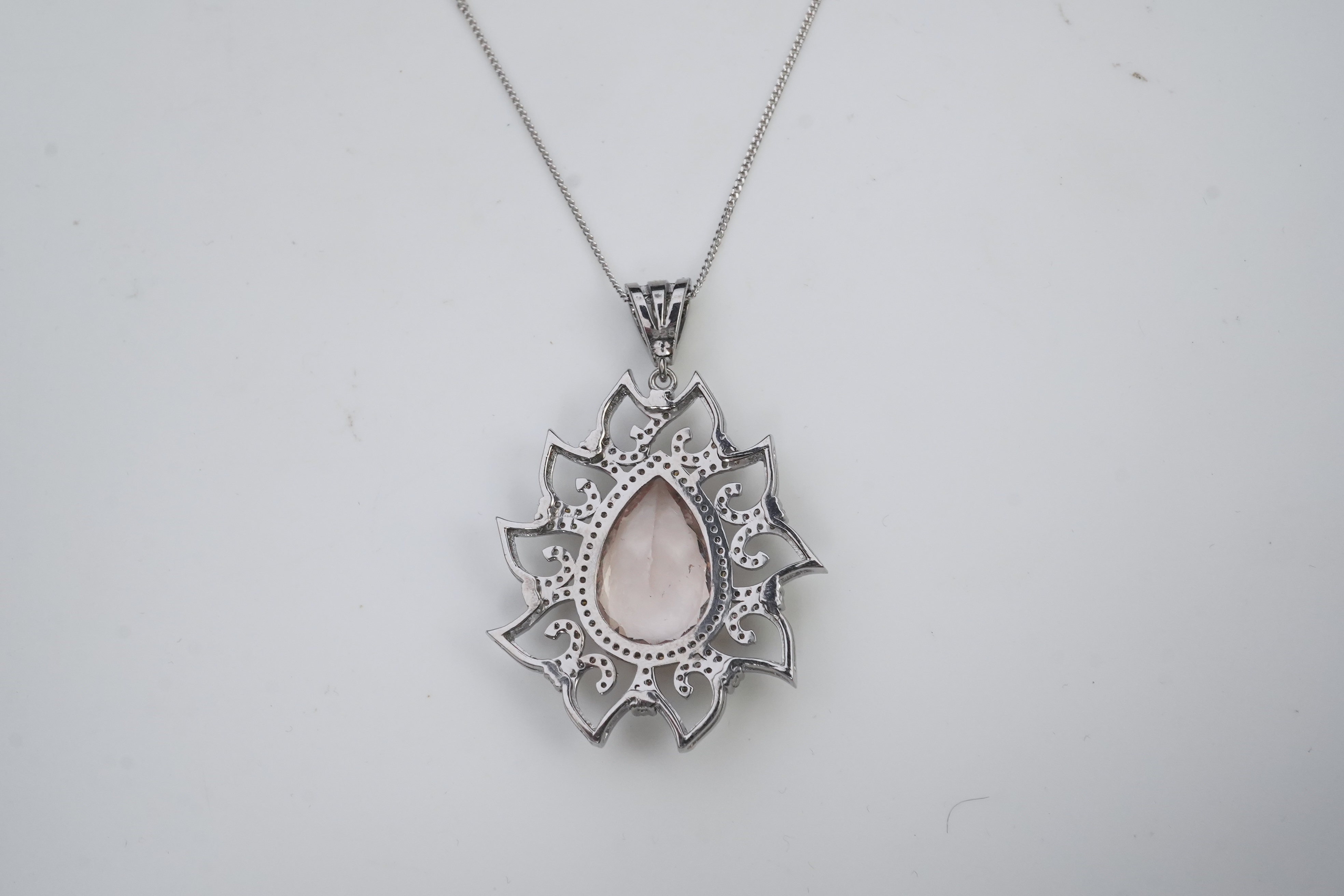 A morganite and diamond pendant